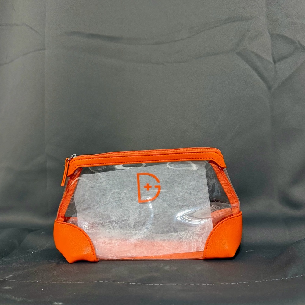 Dr. Dennis Gross Orange Storage Bag